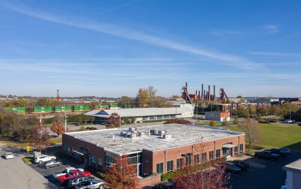 View of Navigate's Headquarters with the Downtown Birmingham in the background