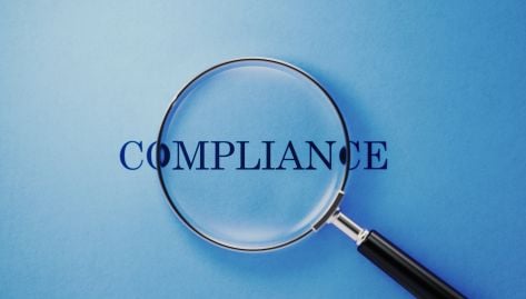 Save Verification Compliance: Magnifying Glass of the word Compliance