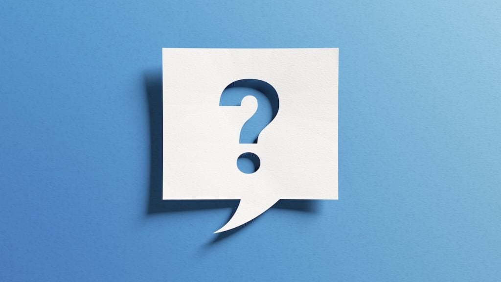 Question mark symbol for FAQ. Minimalist design with icon cutout paper and blue background, does Navigate administer Section 8 vouchers