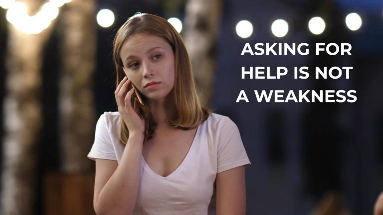 A sad looking woman on the phone