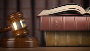 photo shows LAW Text books - 21st Century ROAD to Housing Act becomes law