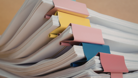 Section 214 Verification Changes: Image showcases generic pile of documents as blog reveals major changes to documenting on property.