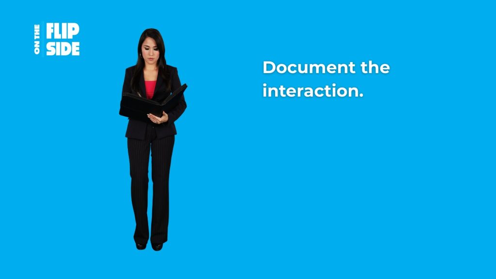 A woman in business suit looking at documents