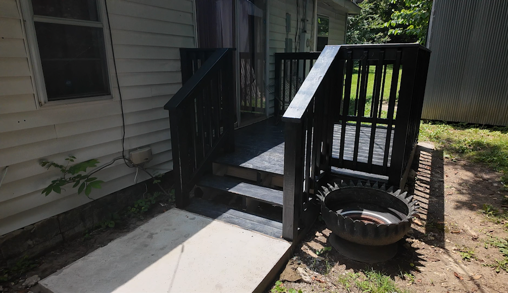 A new porch that replaces the old as part of the program.