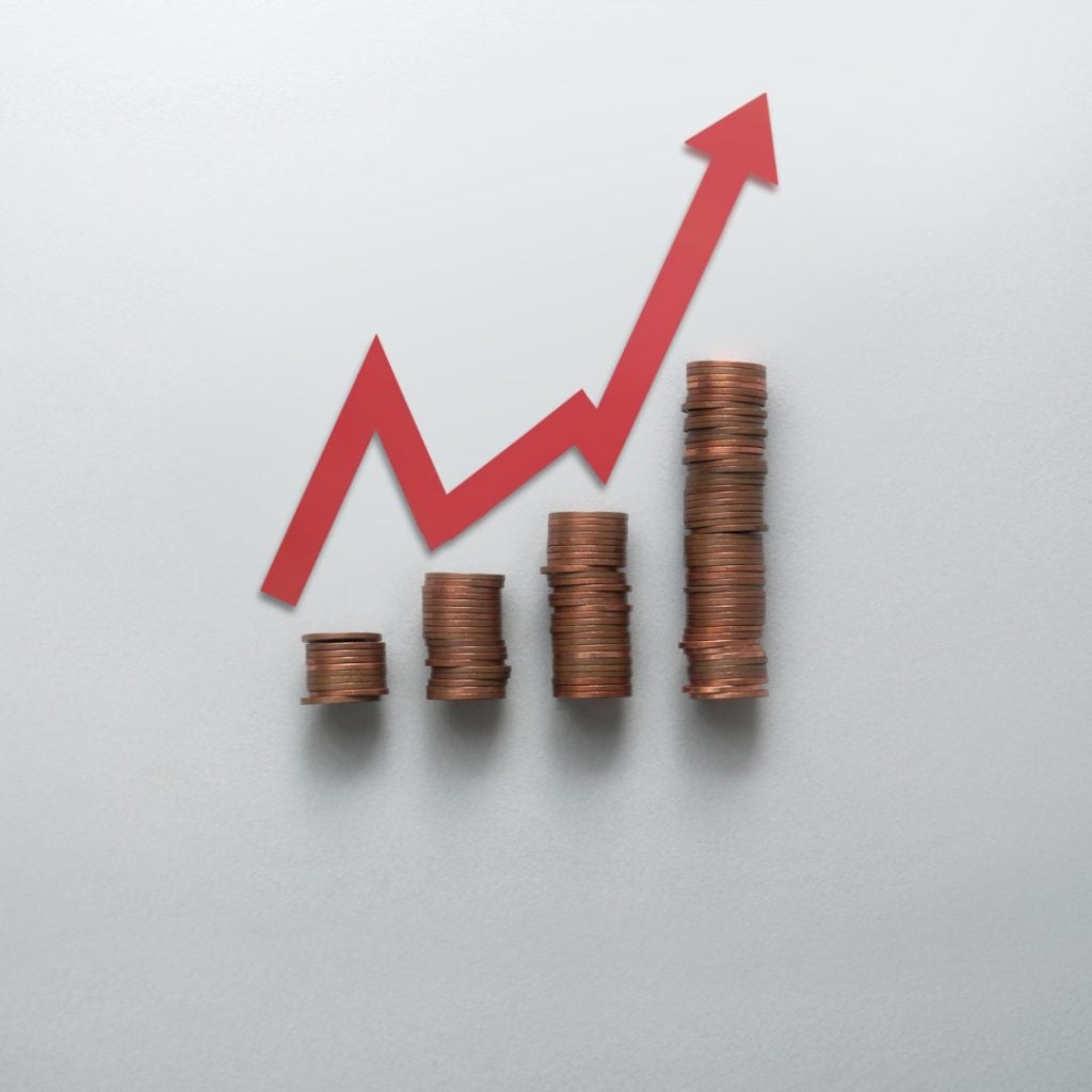 2027 inflationary adjustment, 2026 inflationary adjustments and passbook rate; coins on white background with an arrow representing inflation